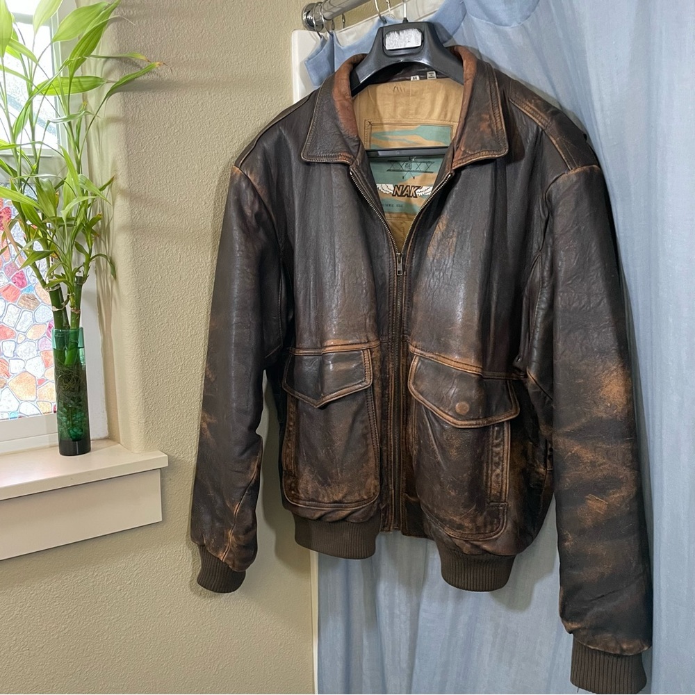 Weathered leather bomber jacket